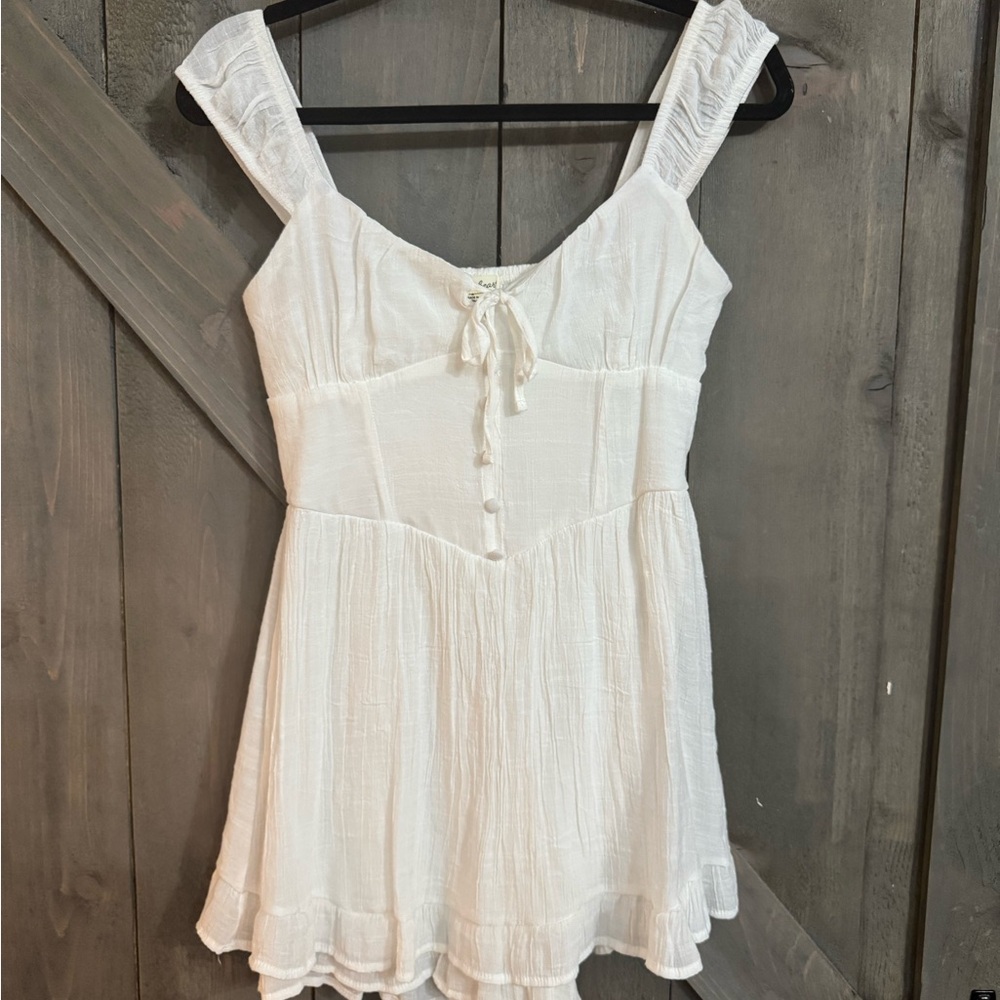 White Sleeveless Dress with Button Detail
